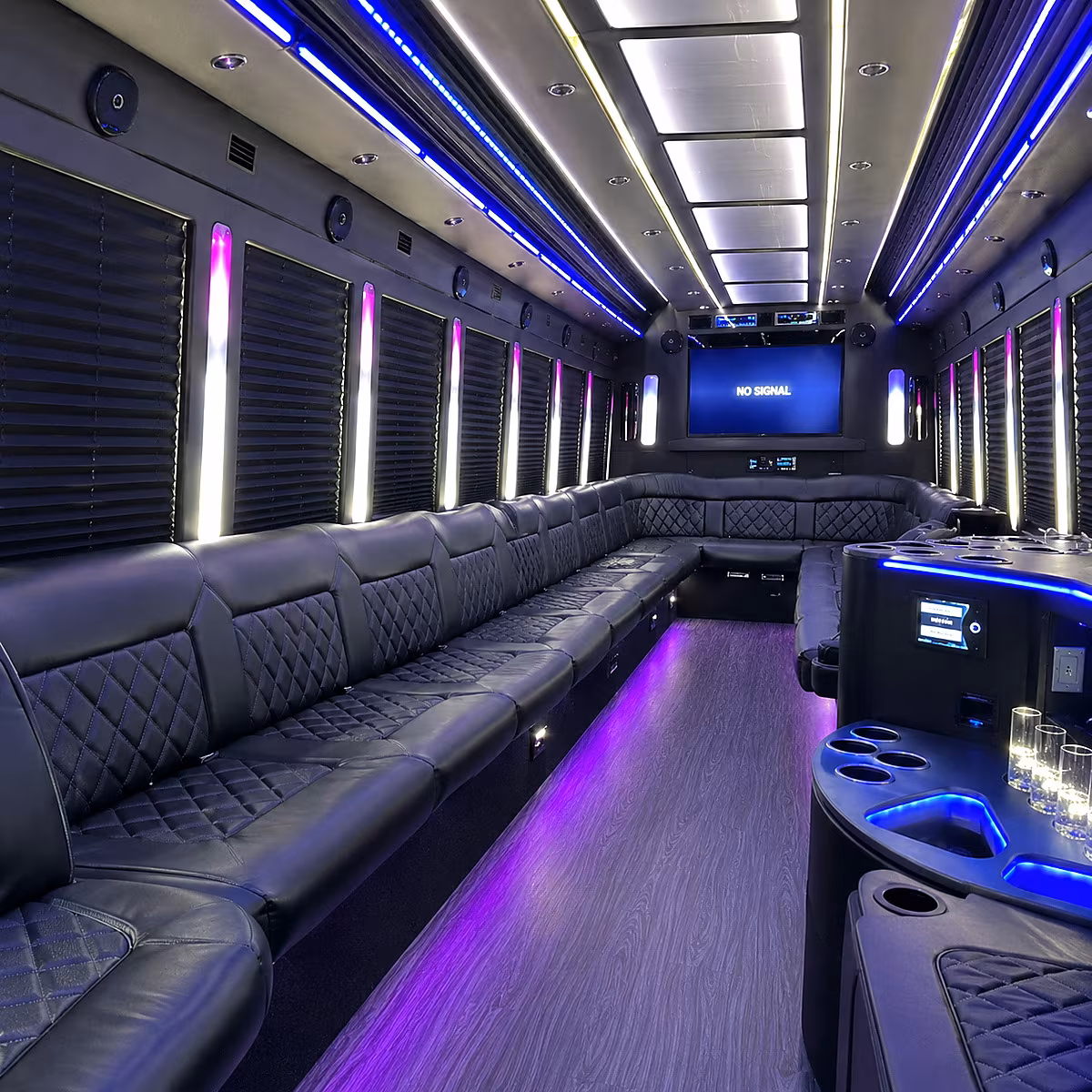 Wedding guests seated inside a party bus serving Knoxville